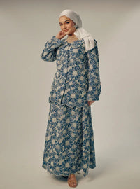 A woman dressed in Turquoise Tun Habiba Eyelet Set