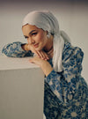 A woman dressed in Turquoise Tun Habiba Eyelet Set