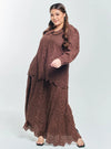 A woman Walnut Tun Hasmah Eyelet Skirt Set