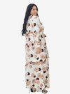 A woman dressed in White Aminah Kurung Modern