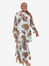 A woman dressed in White Aneesa Flower Printed Kurung