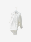 A woman dressed in White Dropped Shoulder Satin Shirt