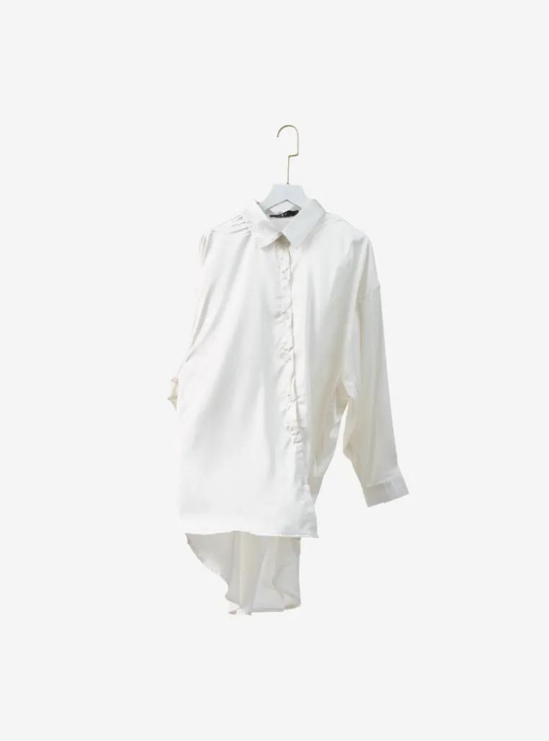 A woman dressed in White Dropped Shoulder Satin Shirt