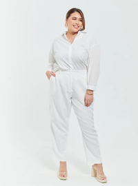 A woman wearing White Skinny Tuxedo Trouser