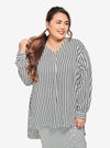 A woman dressed in White Striped Mandarin Collar Oversized Shirt