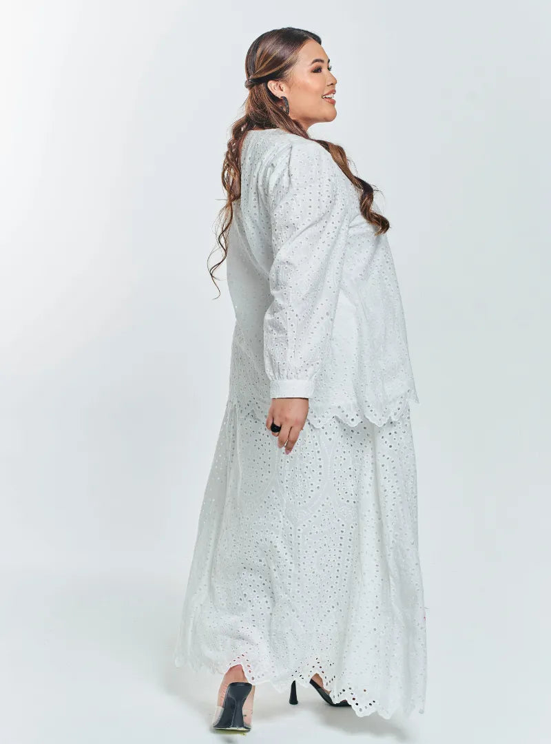 A woman White in Tun Hasmah Eyelet Skirt Set