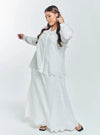 A woman in White Tun Hasmah Eyelet Skirt Set
