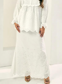 A woman wearing White Ezzah Eyelet Doll Skirt