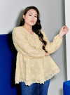 A woman dressed in Yellow Tun Ava Embroidered Top